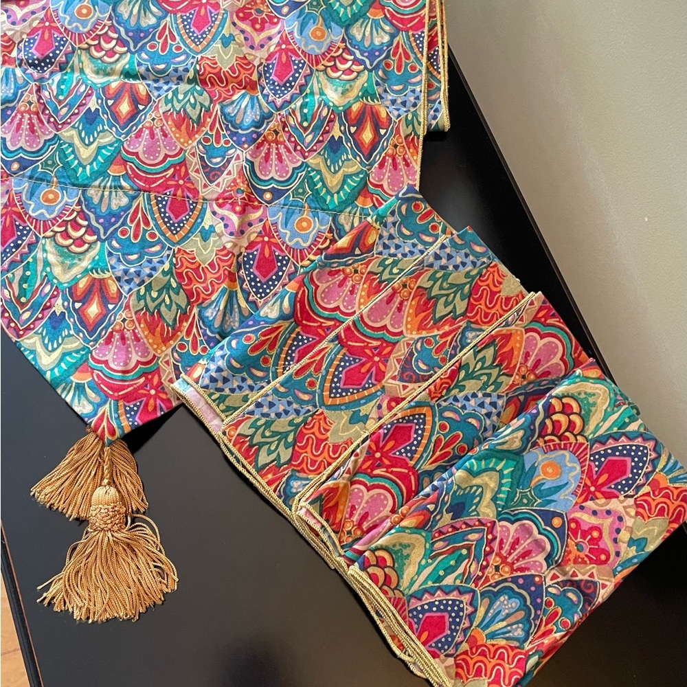 Colorful Patterned Table Runner with Tassels with matching napkins.